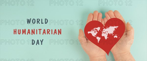 Red heart with world map, humanitarian help day, charity, support and volunteering concept