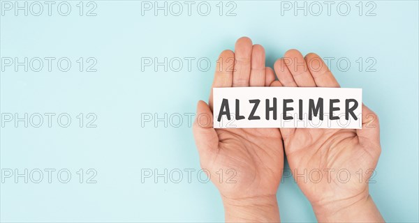 Alzheimer stands on a paper, awareness day, dementia diagnosis, ParkinsonÂ´s disease, memory loss