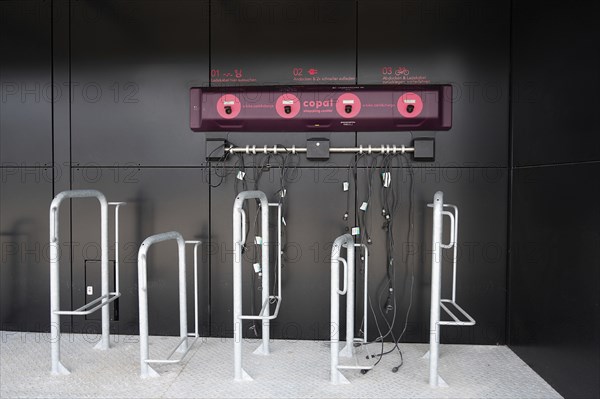 Electric bicycle recharging battery station, eco power and environment, green sustainable energy,
