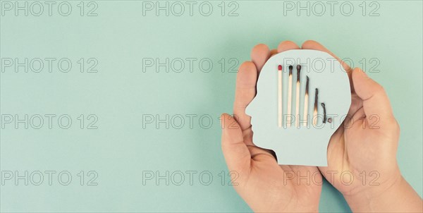 Exhaustion and stress, burnout in hustle culture, low energy, burning matches in a chain, domino