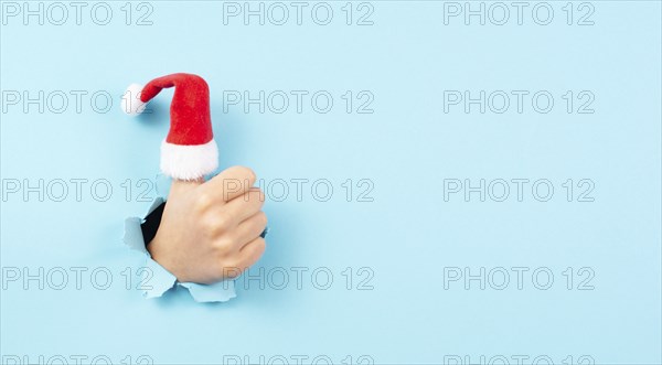 Thumb up, Santa Claus hat, Christmas holiday, positive hand gesture, optimism and emotion, winter