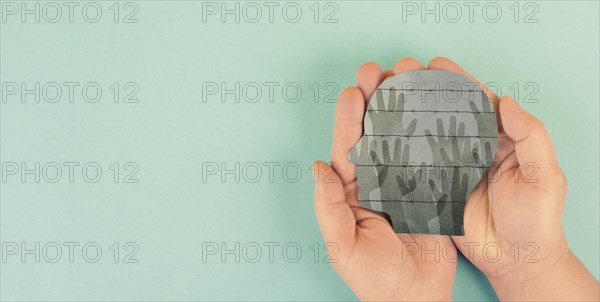 Hands behind a barbed wire, refugee camp, border, illegal immegration, prison fence, migration and