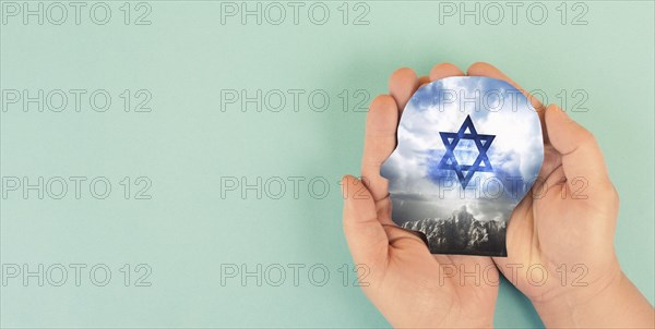 Holding face with flag of Israel, Star of David, war between jewish and palestinians, protection of