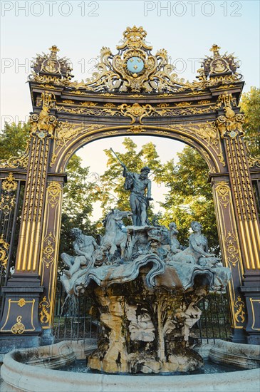 Neptune Fountain at the Place Stanislas in Nancy, France, departement Lorraine, golden gate, Europe