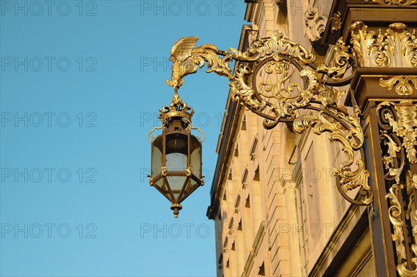 Lantern from place Stanislas in Nancy, France, golden streetlight in departement Lorraine, Europe