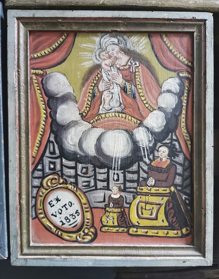 Votive pictures, votive tablets on the walls of the chapel of grace inside the church, pilgrimage