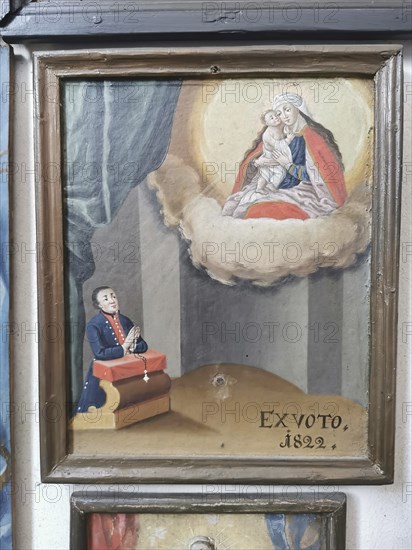 Votive pictures, votive tablets on the walls of the chapel of grace inside the church, pilgrimage