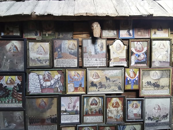 Votive pictures, votive tablets on the walls of the chapel of grace inside the church, pilgrimage