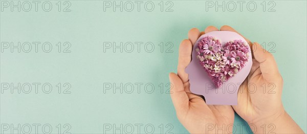 Brain with heart of flowers, love and passion, self esteem and mental health care concept, positive