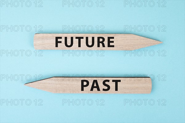 Arrows show to different directions, past and future, progress and development, taking a new path,