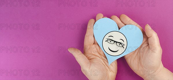 Heart with a smiling face and eyeglasses, mental health concept, positive mindset, support and