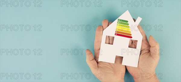 House with power consumption graphic, renewable substainable energy, solar electrcity, green co2