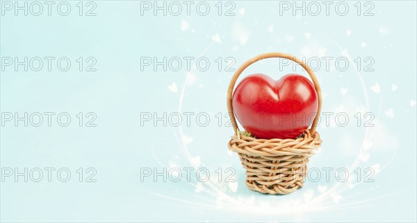 Wicker basket with a big red heart, greeting card for valentines day, mothers day or birthday, love