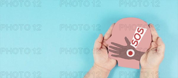 Domestic violence, hand hits face, sos on exclamation mark, international awareness month october