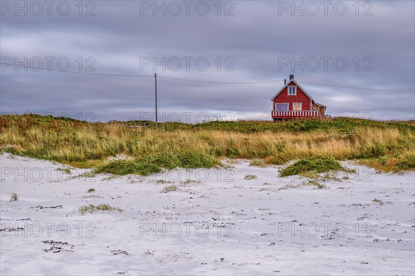 House on Hvit beach in Eggum, Rorbur, Bostad, Vestvagoy, Lofoten, Nordland, Norway, Europe