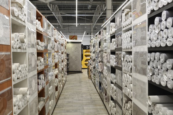 Moscow, Russia -21 Aug. 2022. Sample wallpaper rolls in the Petrovich building materials store