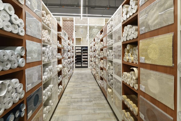 Moscow, Russia -21 Aug. 2022. Sample wallpaper rolls in the Petrovich building materials store