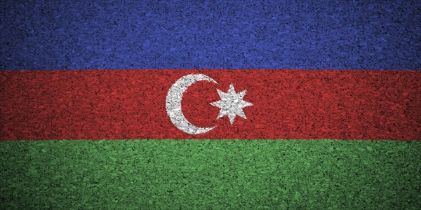 The Azerbaijani flag painted on a cork board
