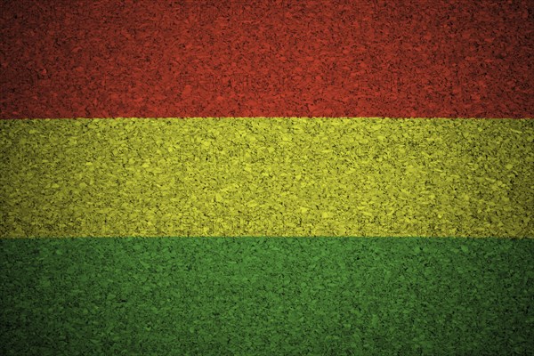 The Bolivian flag painted on a cork board