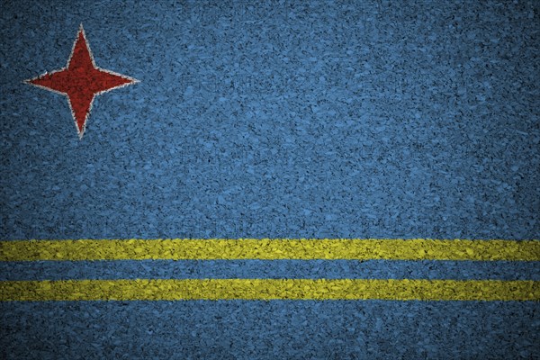 The Aruba Flag painted on a cork board