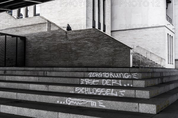 Graffiti on steps below the Franklinbrücke, a road and pedestrian bridge in Düsseldorf-Pempelfort,