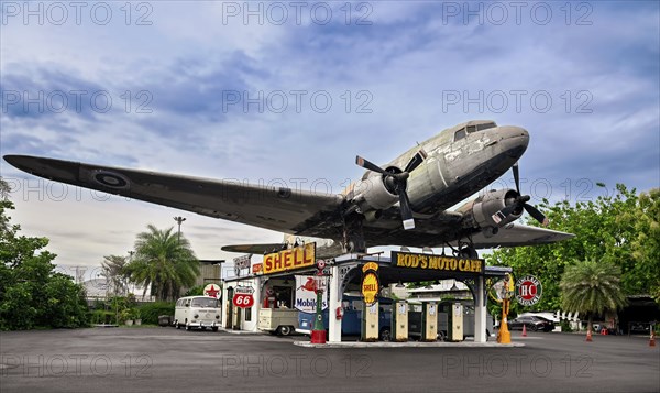 Petrol station and propeller plane