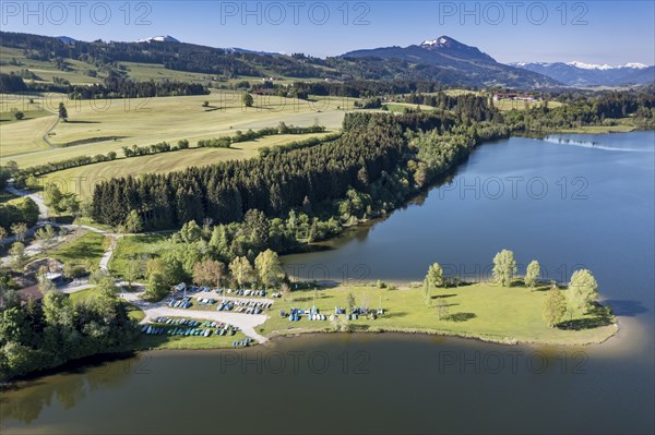 Aerial view over lake Rottachsee towards mountain Grünten, Allgäu, Bavaria, Germany, Europe