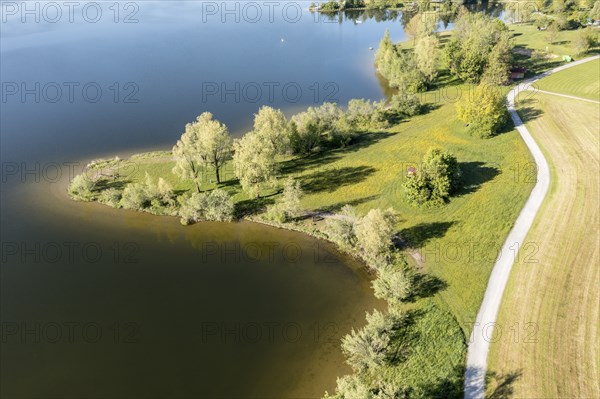 Aerial view of a small peninsula of lake Rottachsee, meadows of bathing area, Allgäu, Bavaria,