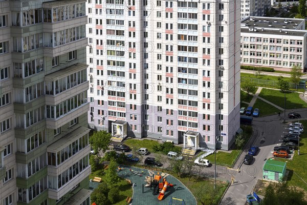 Moscow, Russia, May 29. 2022. Ordinary city yard with cars on a top, Europe
