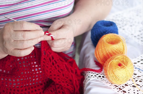 Women's hands are knitted shawl