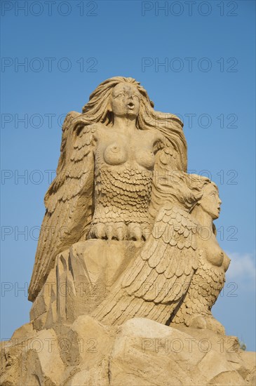 Sirens, sand sculpture in the sky