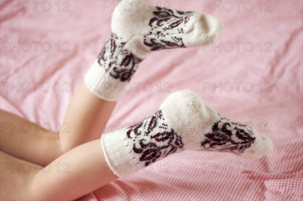Children's feet in wool socks