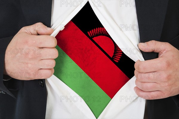The Malawi flag painted on the chest of a man