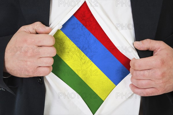The Mauritius flag painted on the chest of a man