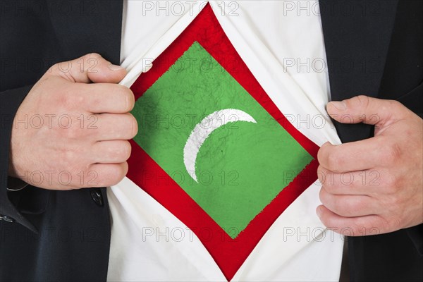 The Maldives flag painted on the chest of a man