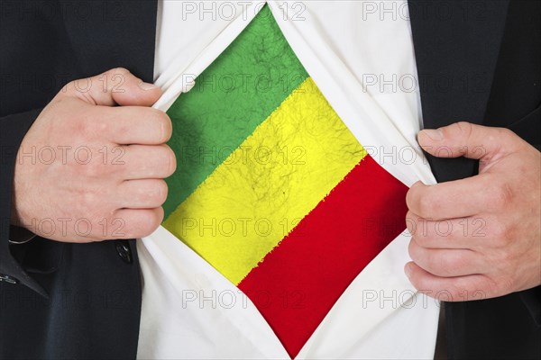The Malian flag painted on the chest of a man