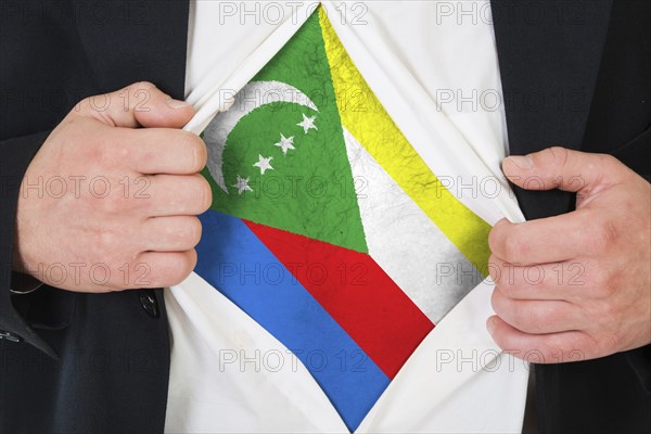 The Comoros flag painted on the chest of a man