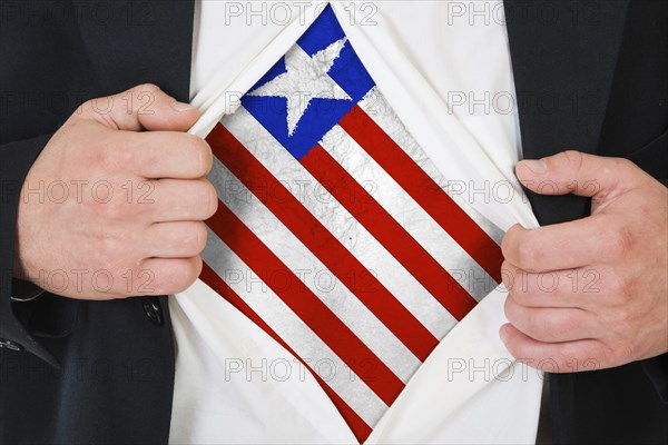 The Liberian flag painted on the chest of a man