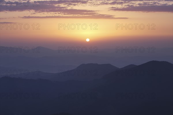 Rising sun under Carpathian mountains, Ukraine, Europe