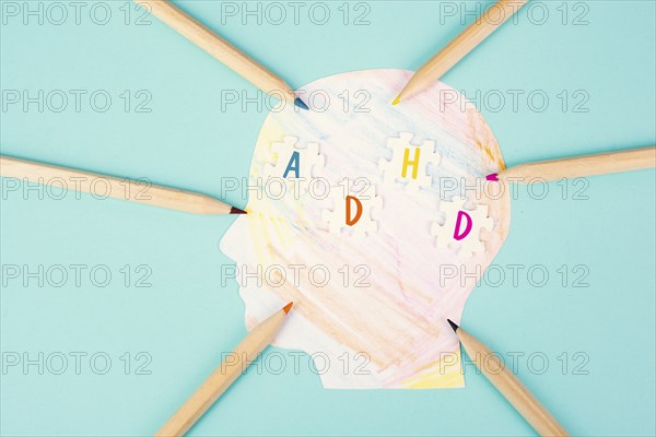 ADHD, attention deficit hyperactivity disorder, mental health, colored paper with pencils