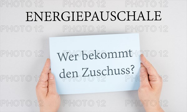 Energy flat rate, who receives the subsidy is standing in german language on the paper, finanical