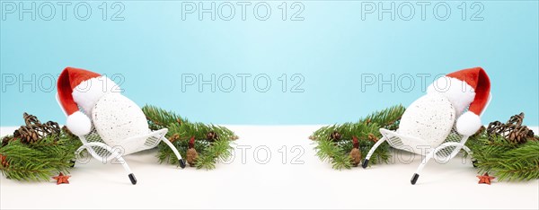 Santa Claus with a red hat sitting in a lounge chair, holiday by the sea, taking a vacation,