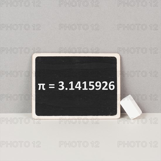 The mathematical constant pi 3, 141 is standing on a chalkboard, defined in Euclidean geometry as