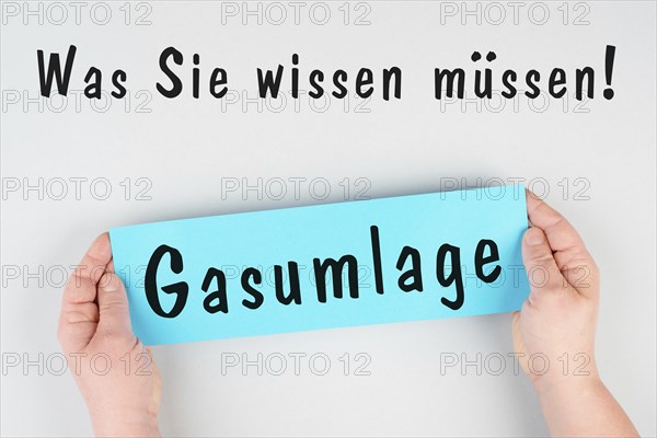 Gas commission is standing in german language on the paper, new fee regualtion in Germany, risk for