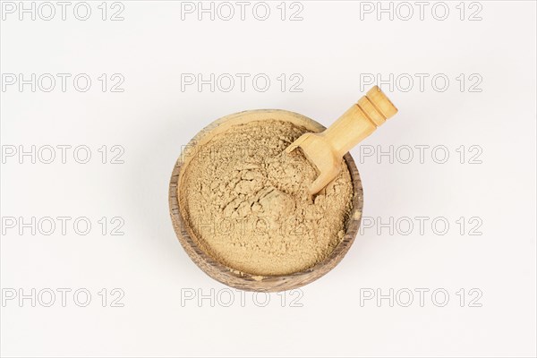 Healing earth powder in a bowl, supplement and antioxidant for to detox the body, alternative
