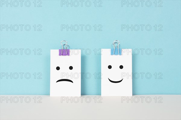 Head with a sad and a happy face, mental health concept, positive and negative mindset, depression,