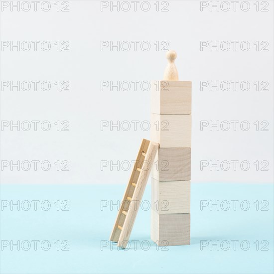 Man was climbing up the ladder, having a goal, brainstorming for ideas, success strategy, taking a