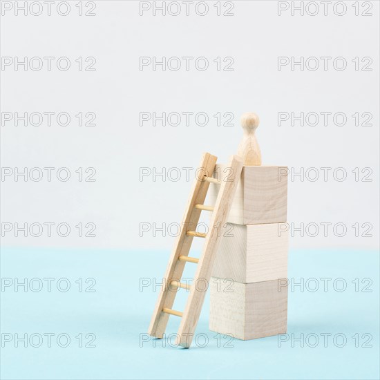 Man was climbing up the ladder, having a goal, brainstorming for ideas, success strategy, taking a