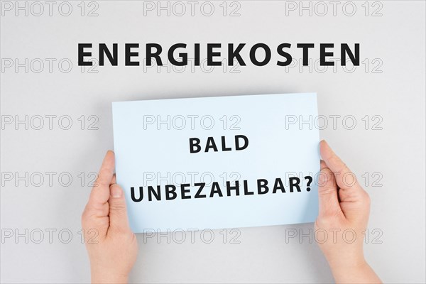 Energy prices soon unaffordable is standing in german language on the paper, increasing prices,