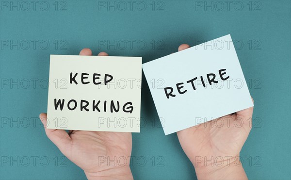 Keep working or retire, making a decision, planning the future, retirement concept, financial and